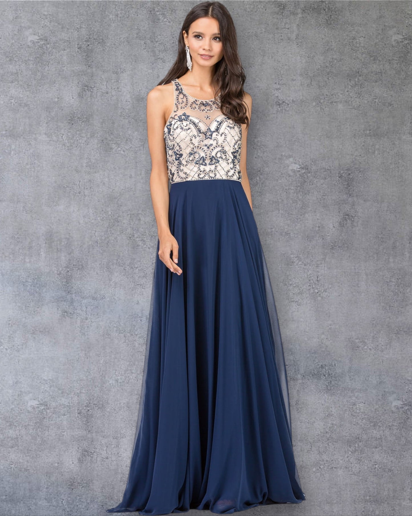 Vestido de fiesta sin mangas con escote joya y falda fluida en forma de A con corpiño bordado